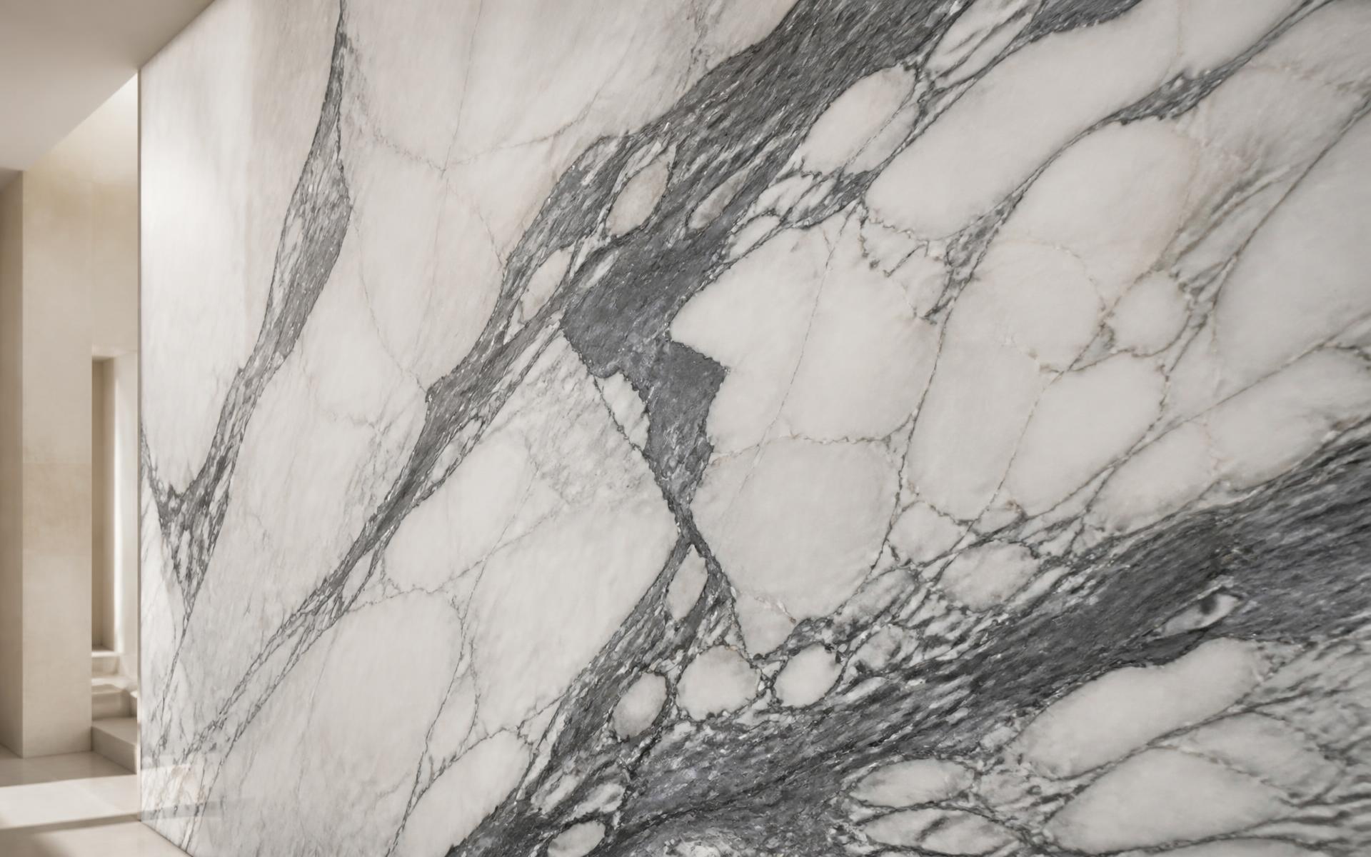 Bookmatched quartzite slab wall in a New Zealand interior